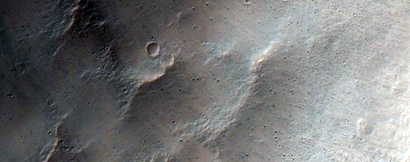 Fresh Crater on Dissected Highland Plateau
