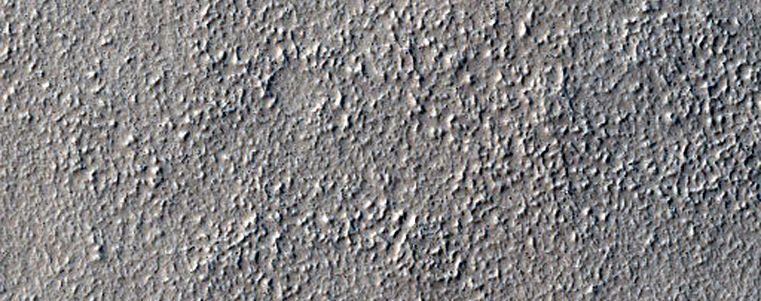 Layered Feature in Crater in Nilosyrtis Mensae