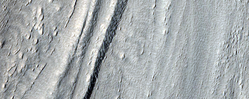 Tongue-Shaped Feature on Slope Seen in MOC Images R04-02106 and R12-01135