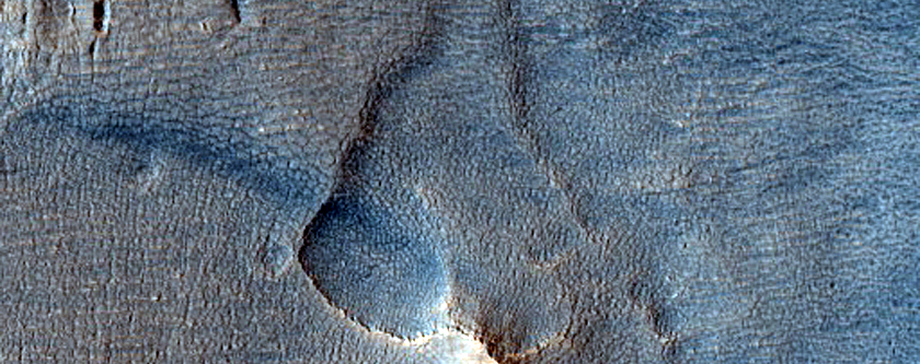 Troughs and Pits around Mesa in Deuteronilus Mensae
