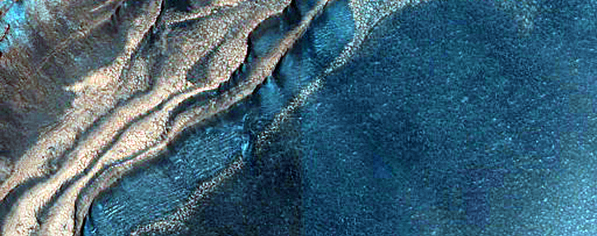 North Polar Layered Deposits Scarp near Dunes Dubbed Tleilax