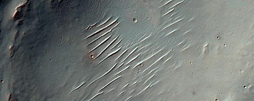 Possible Mafic Minerals Exposed by Solis Dorsa Crater