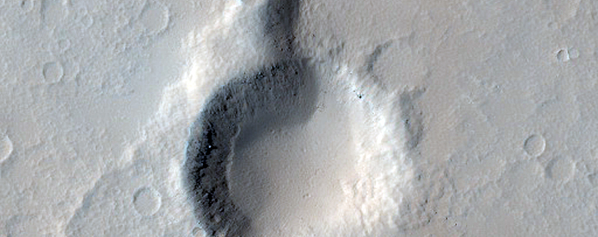 Crater Intersecting Ridge East of Elysium Mons