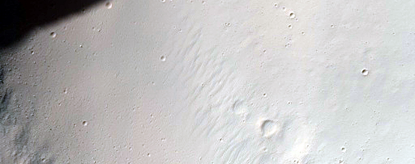 Crater on Tyrrhenus Mons