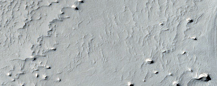 Layers Exposed on Crater Floor Northwest of Schiaparelli Crater