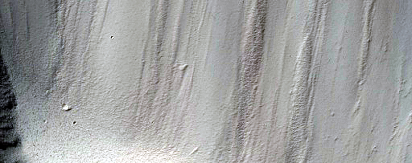Well-Preserved 10-Kilometer Impact Crater with Layered Ejecta