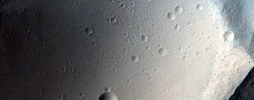 Material Beyond Margins of Ridged Lobe Northwest of Olympus Mons