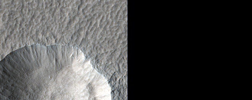 Small Impact into Debris Covered Glacier