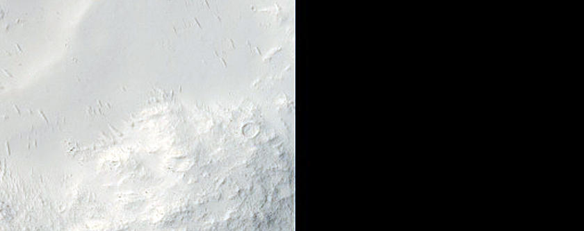 Impact Crater in Tartarus Montes