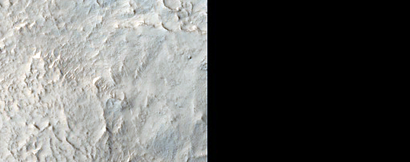 Small Crater with Dark Ejecta in Protonilus Mensae