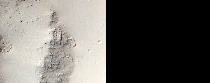 Scour Pits in Crater in Medusae Fossae Formation