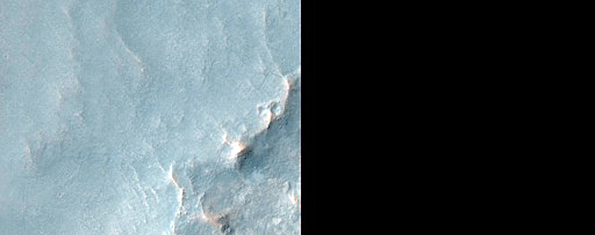 Possible Clay-Rich Terrain on Crater Floor North of Syrtis Major Planum