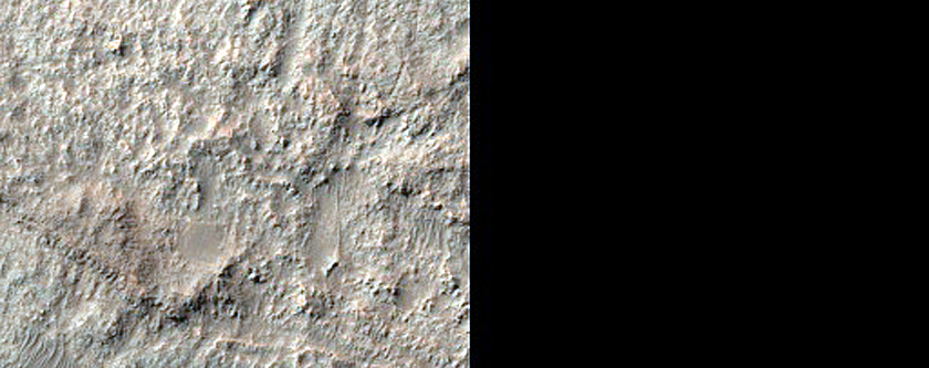 Possible Mafic-Rich Terrain in Eastern Eos Chasma