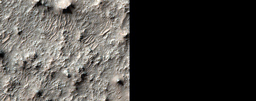 Mafic Mineral-Bearing Plains South of Huygens Crater