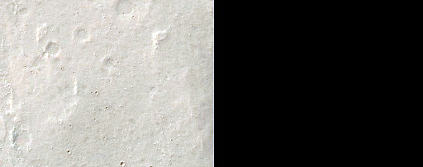 Possible Olivine-Rich Ejecta of Solis Planum Crater