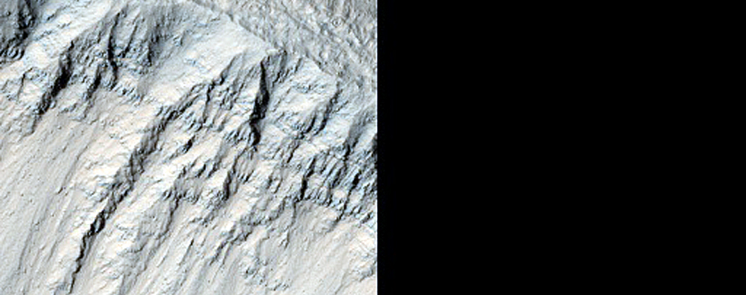 Layers in Crater near Tinjar Valles