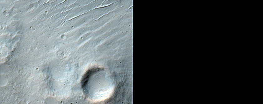 Craters Exposing Mafic Mineral-Rich Terrain in Hesperia Planum