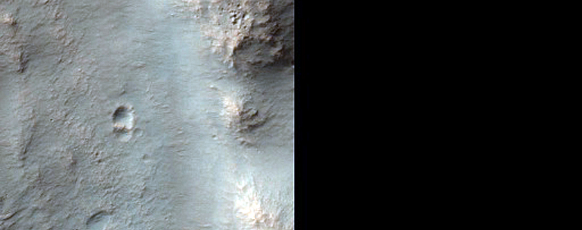 Channel and Crater in Southern Mid-Latitudes