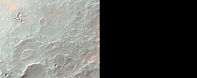 Layered Deposits at Boundary between Thaumasia Planum and Noachis Terra