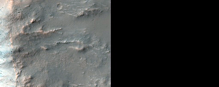Crater Exposing Minerals in Terra Sabaea