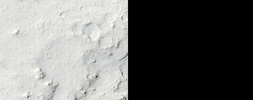 Layered Streamlined Features in Marte Vallis