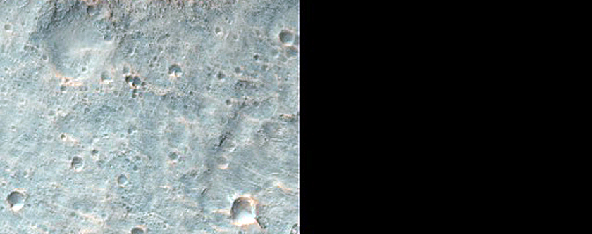 Periodic Bedrock Ridges in McLaughlin Crater