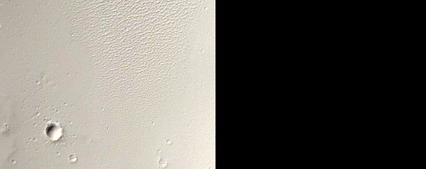Crater West of Apollinaris Mons