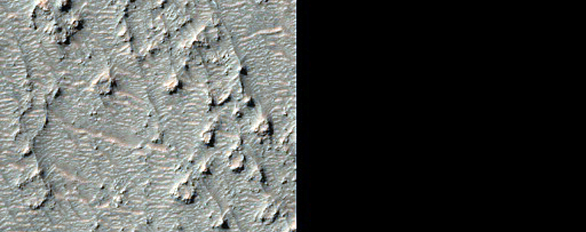 Olivine-Bearing Materials on Kamativi Crater Floor