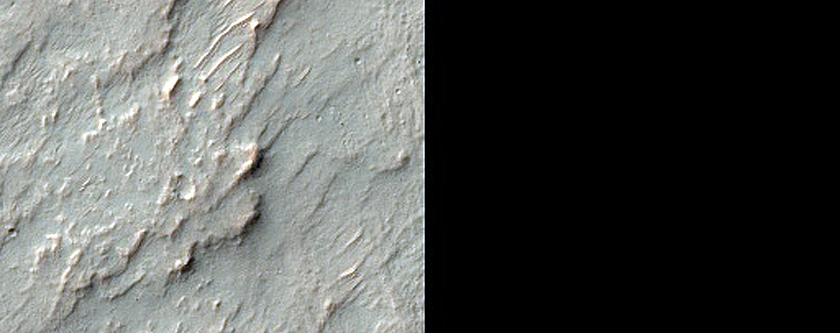 Phyllosilicates Exposed by Small Crater in Terra Sabaea