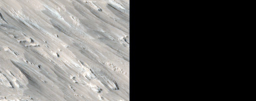 Landforms near Gordii Dorsum