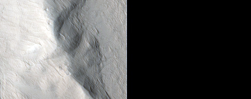 Elliptical Depression on Lower Northwest Flank of Hecates Tholus