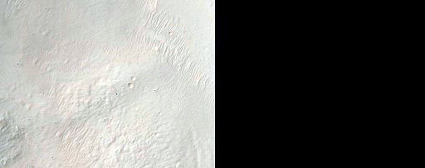 Crater Exposing Bedrock