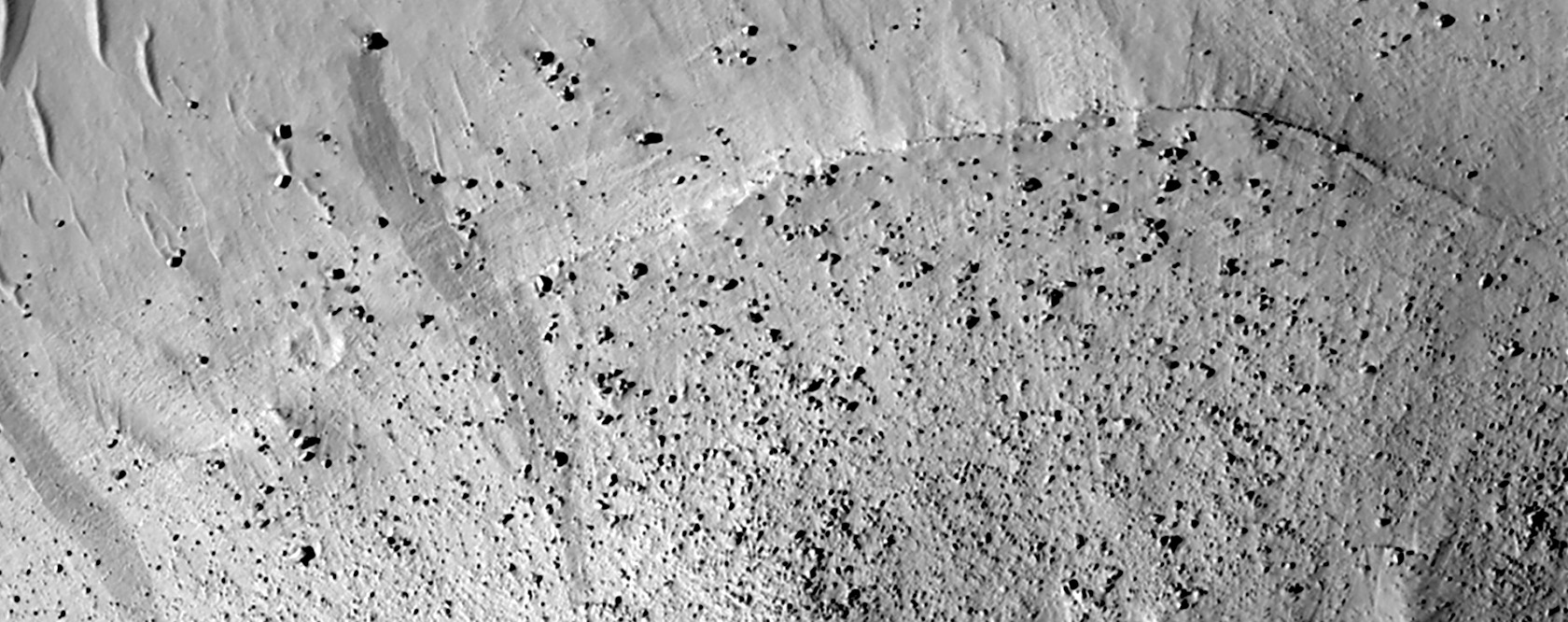 Boulders Tumbling Down a Mesa in Cassini Crater