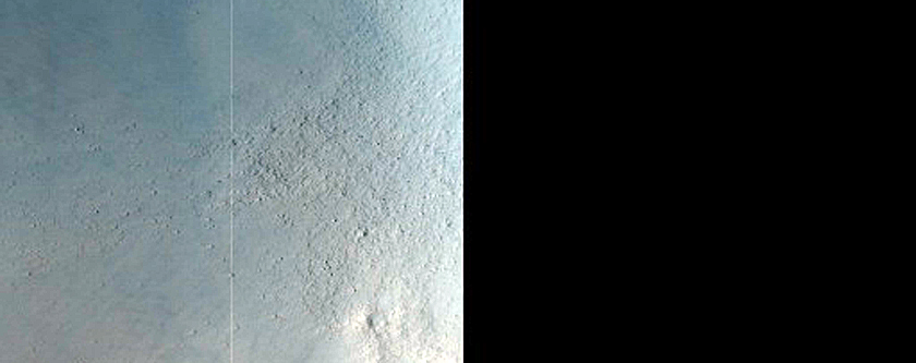 Acidalia Planitia Impact Crater Exposing Layered Materials