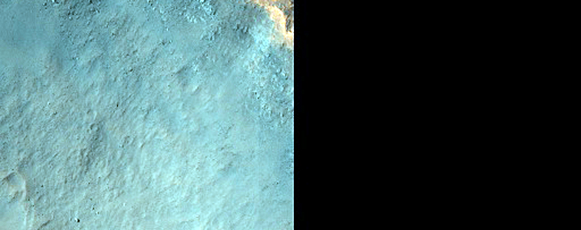 Exposed Crater Walls in Oxia Planum with Light-Colored Mounds