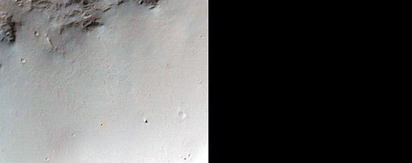 Small Crater in Herschel Crater with Recurring Slope Lineae-Like Features