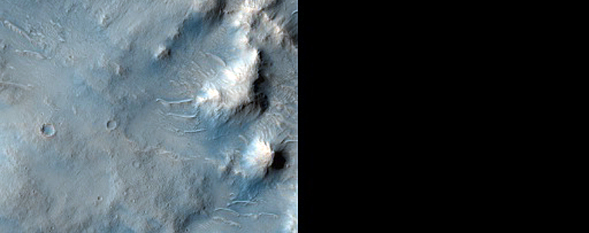 Crater Central Mound Deposits near Dichotomy Boundary in Knobel Crater