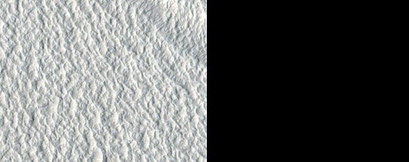 Flow Features in Erebus Montes