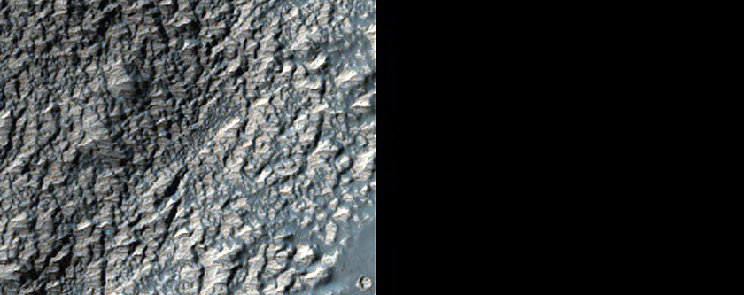 Monitor Light-Toned Exposures near Voeykov Crater