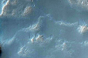Possible Pingos in Crater in Melas Fossae