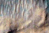 Fresh Crater Exhuming Highland Crust
