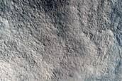 Mantling Layer in Fretted Terrain