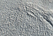 Crater with Mesa in Enipeus Vallis