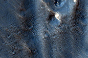 Channel Networks in Claritas Fossae