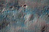 Crater Cross-Section of Pitted Materials with Mafic Spectral Signature