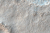 Layered Feature in Crater Northeast of Hellas Montes