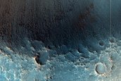 Possible Olivine Exposed by Impact Craters in Northeast Syrtis Major Planum