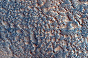 Dipping Layers in Crater South of Deuteronilus Mensae