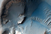 A 1-Kilometer Crater Buried by Candidate Lake Sediments near Deepest Point