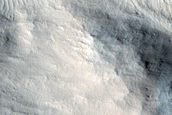 Characterizing Impact-Related Flow Features at Canala Crater